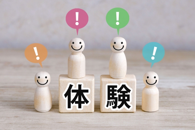 体験をイメージした人形の画像